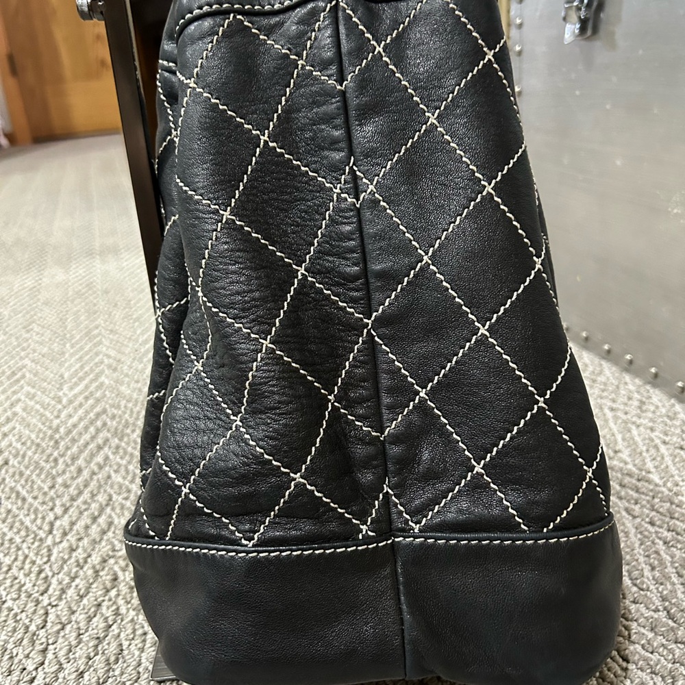 CHANEL Black Quilted Leather Drawstring Bucket Bag with Silver Chain - Picture 5 of 10